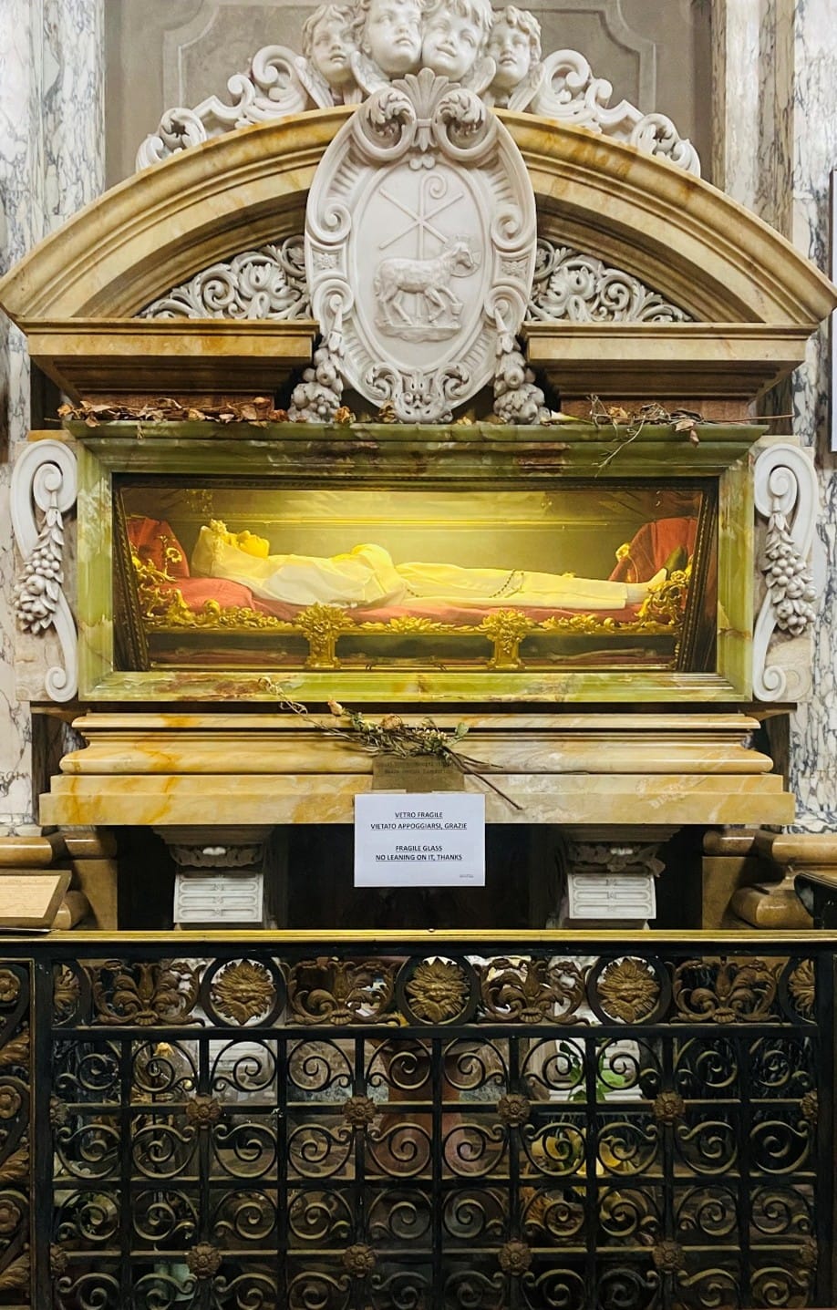 Full body of Blessed Imelda Lambertini in wax effigy dressed in her First Communion attire at her shrine in St. Sigismondo Church in Bologna.
