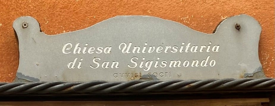 Signage on St. Sigismondo Church in Bologna: Chiesa Universitaria di San Sigismondo.