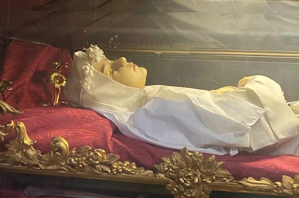 Upper body of Blessed Imelda Lambertini in wax effigy in St. Sigismondo Church in Bologna.